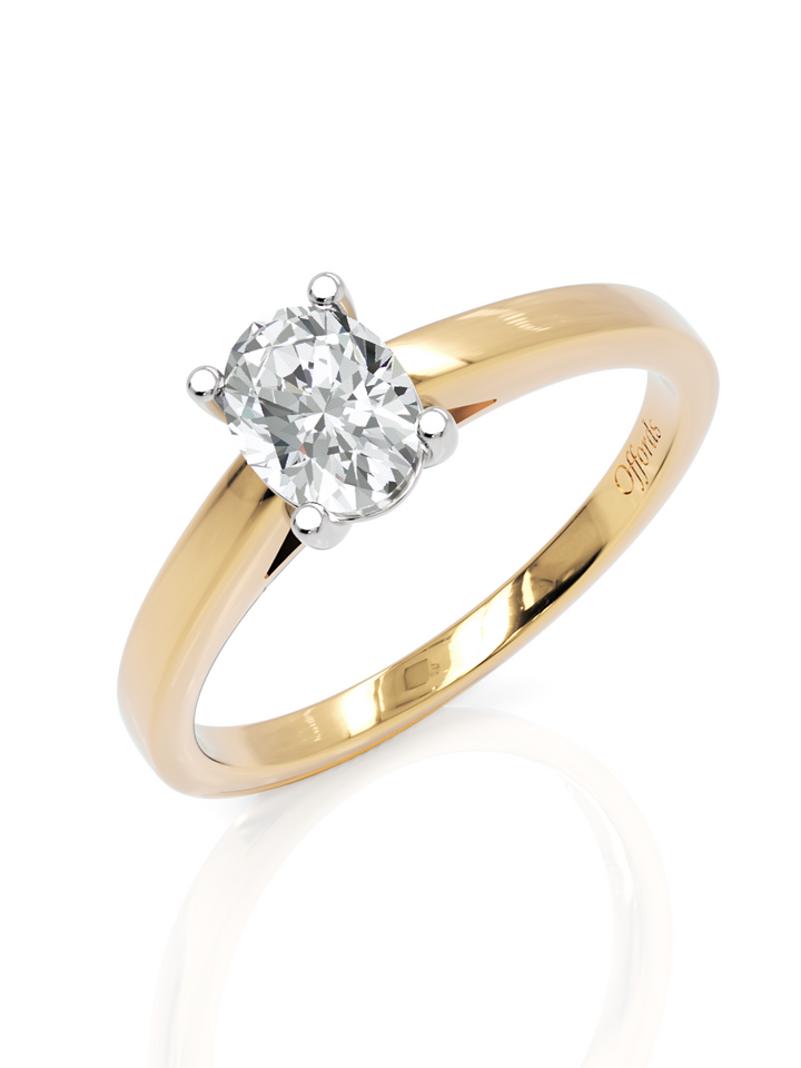 18ct & platinum 0.50ct oval diamond solitaire ring