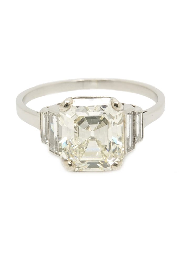 Pre-owned platinum 3ct emerald cut diamond ring