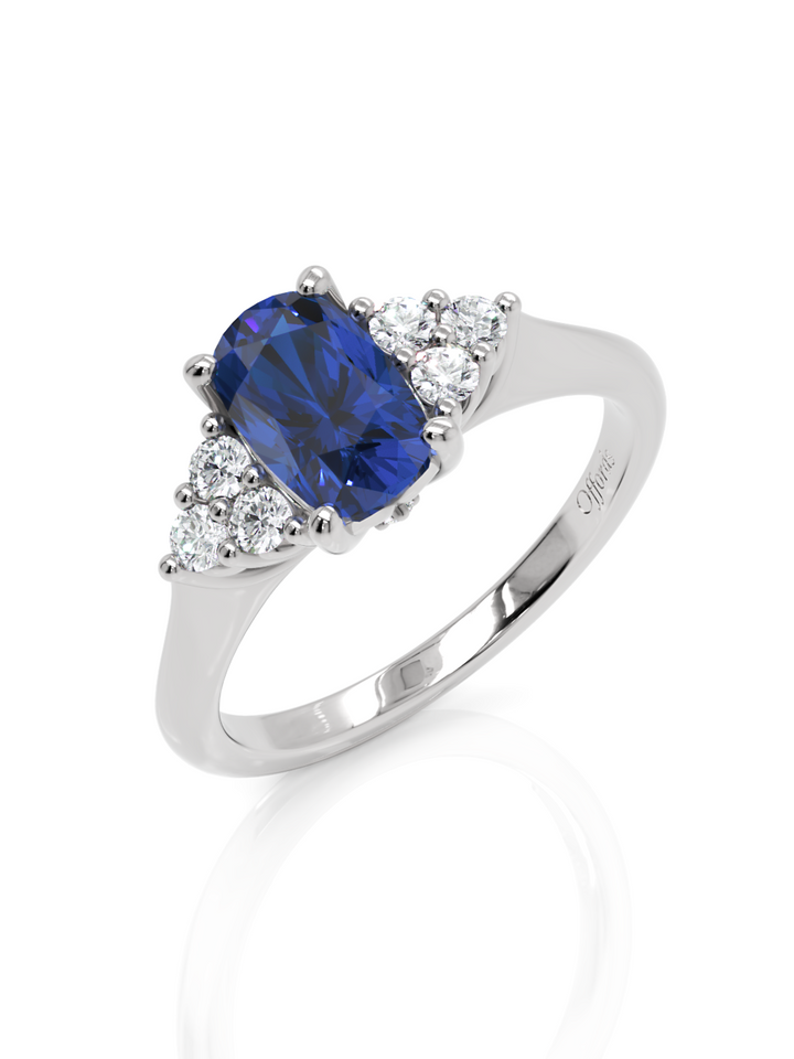 Platinum sapphire & diamond cluster ring