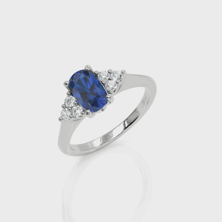 Platinum sapphire & diamond cluster ring