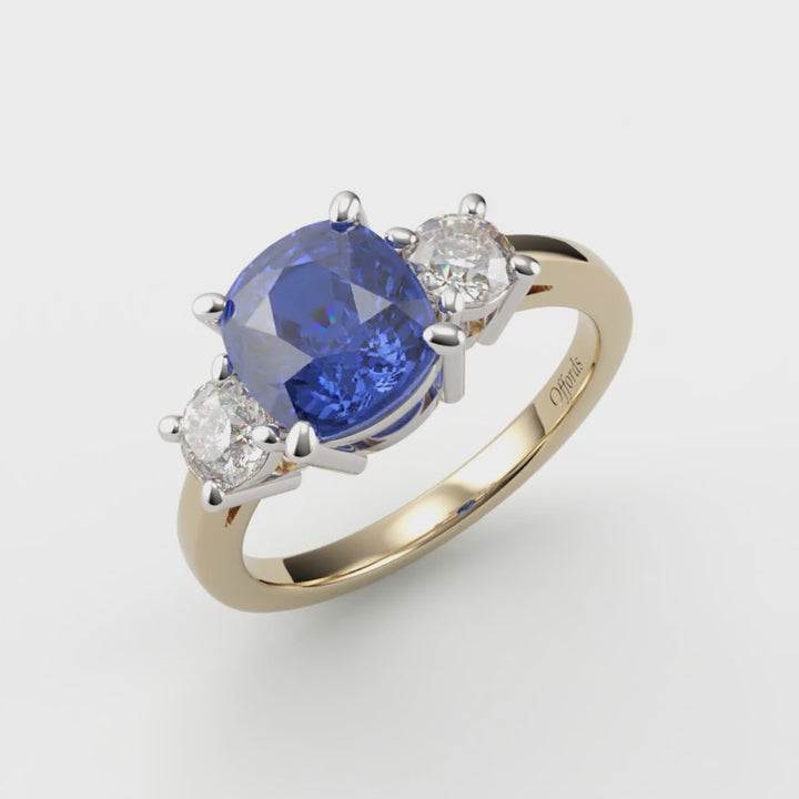 18ct & platinum sapphire & diamond three stone ring