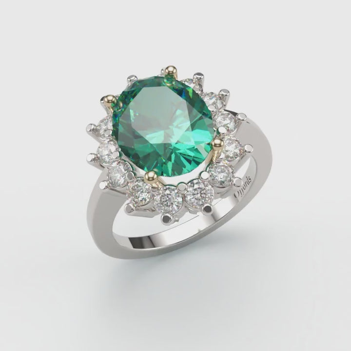 18ct white gold emerald & diamond oval cluster ring