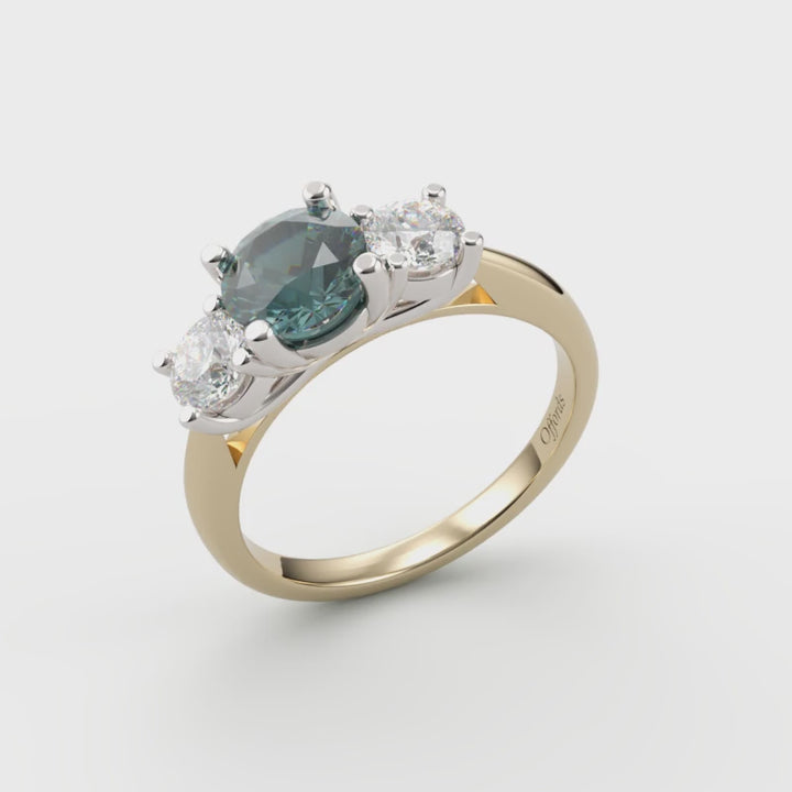 18ct & platinum teal sapphire & diamond three stone ring