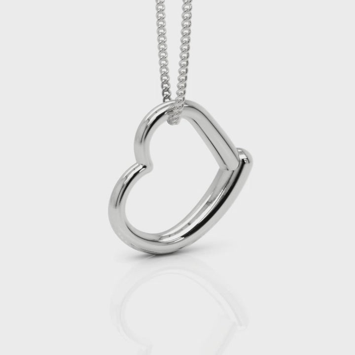 9ct white gold graduated open heart pendant on chain.