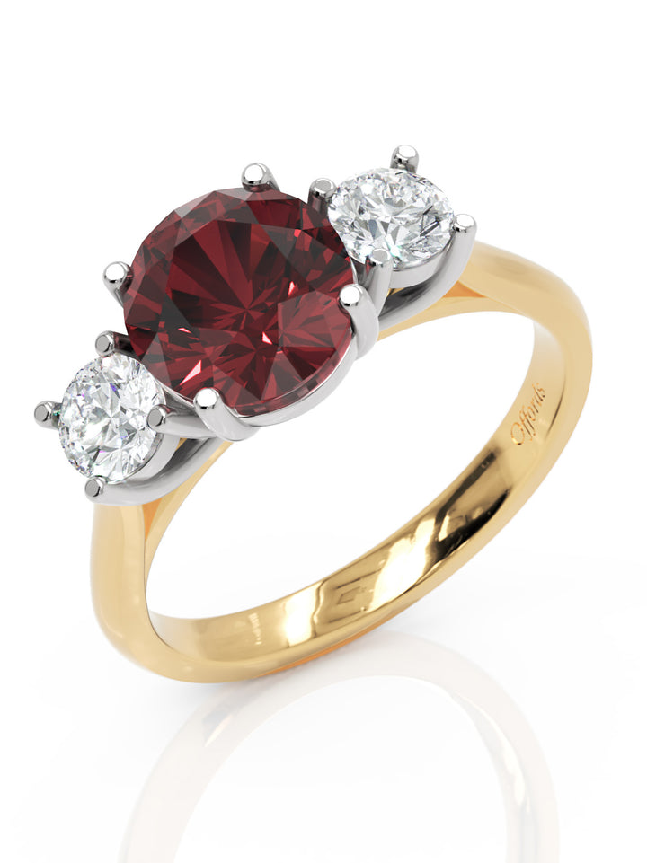 18ct yellow gold & platinum burgundy sapphire & diamond three stone ring