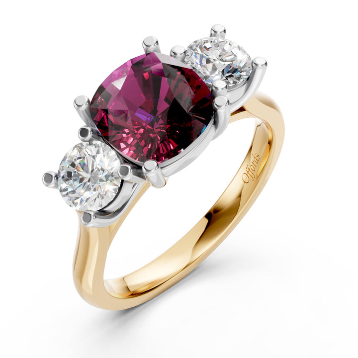 18ct & platinum cushion cut Mozambique ruby and diamond three stone ring