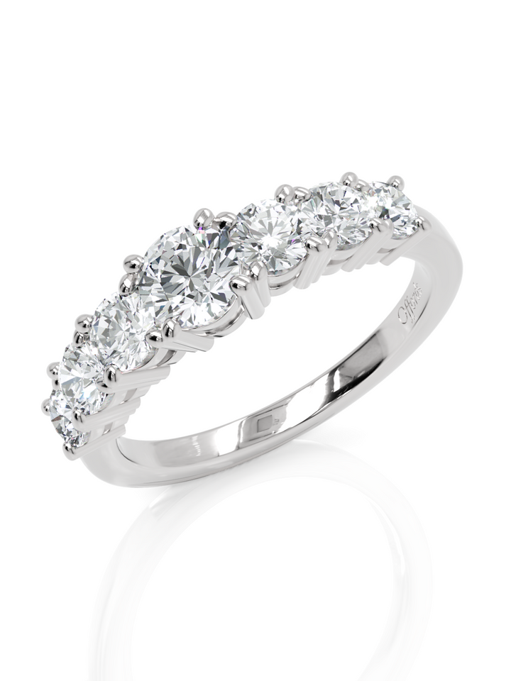 Platinum graduated diamond seven stone ring