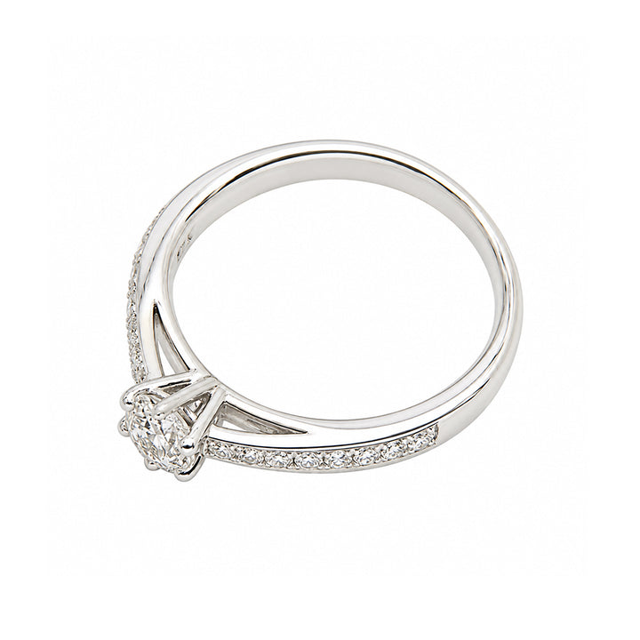 Pre-owned 18ct diamond solitaire with diamond set shoulders