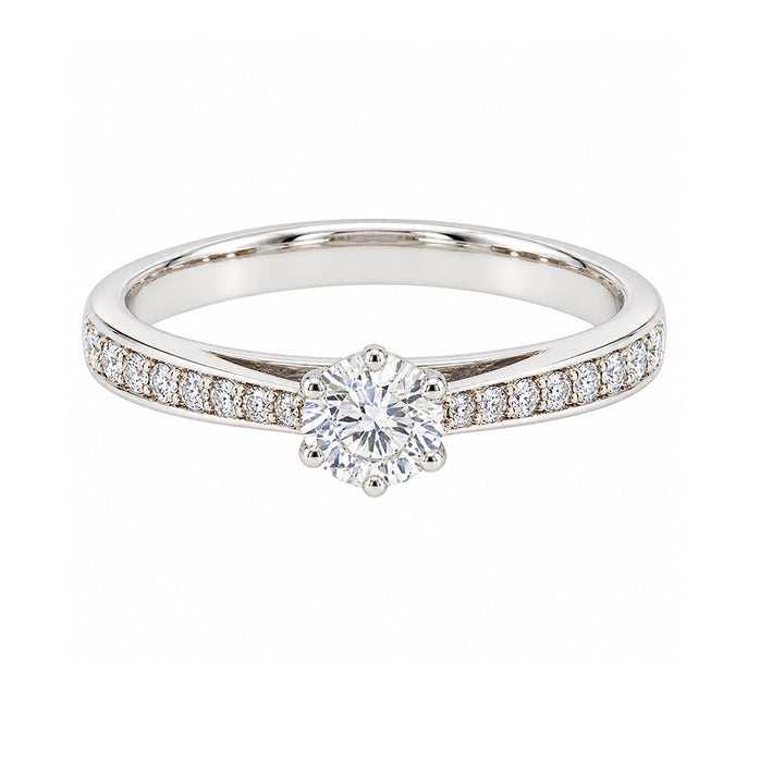 Pre-owned 18ct diamond solitaire with diamond set shoulders