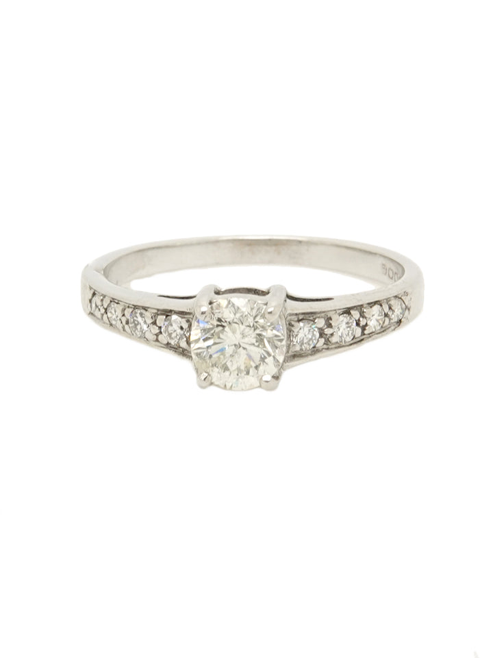 Pre-owned 18ct white gold diamond solitaire ring with diamond shoulders