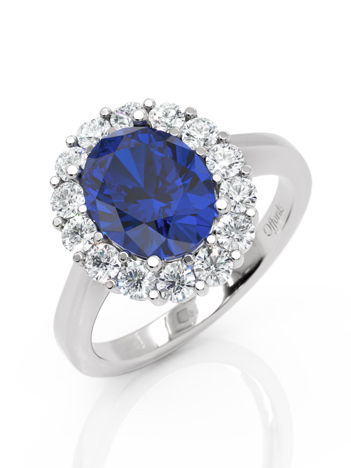 Platinum sapphire & diamond oval cluster ring
