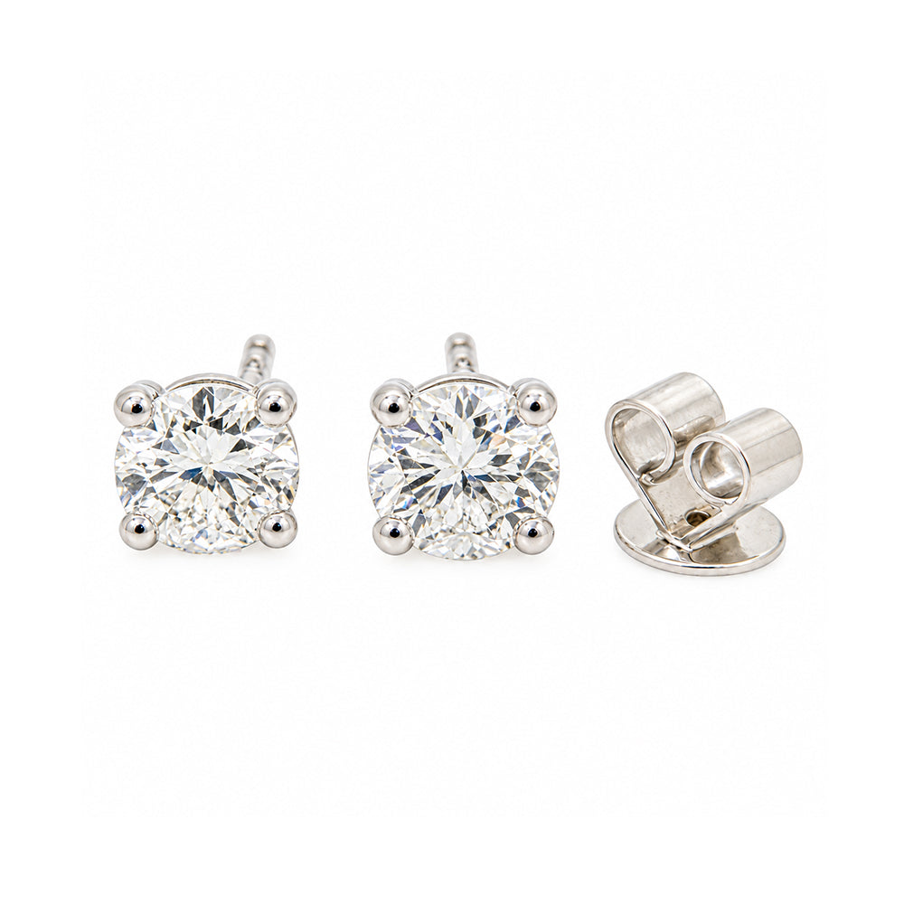 Pre-owned four claw set 1.36ct diamond stud earrings