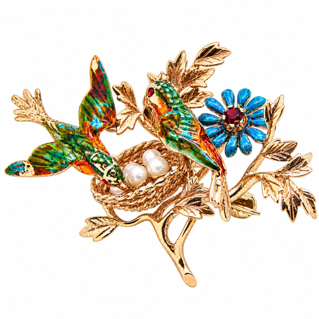 Pre-owned 9ct yellow gold parrots on a branch with a nest brooch