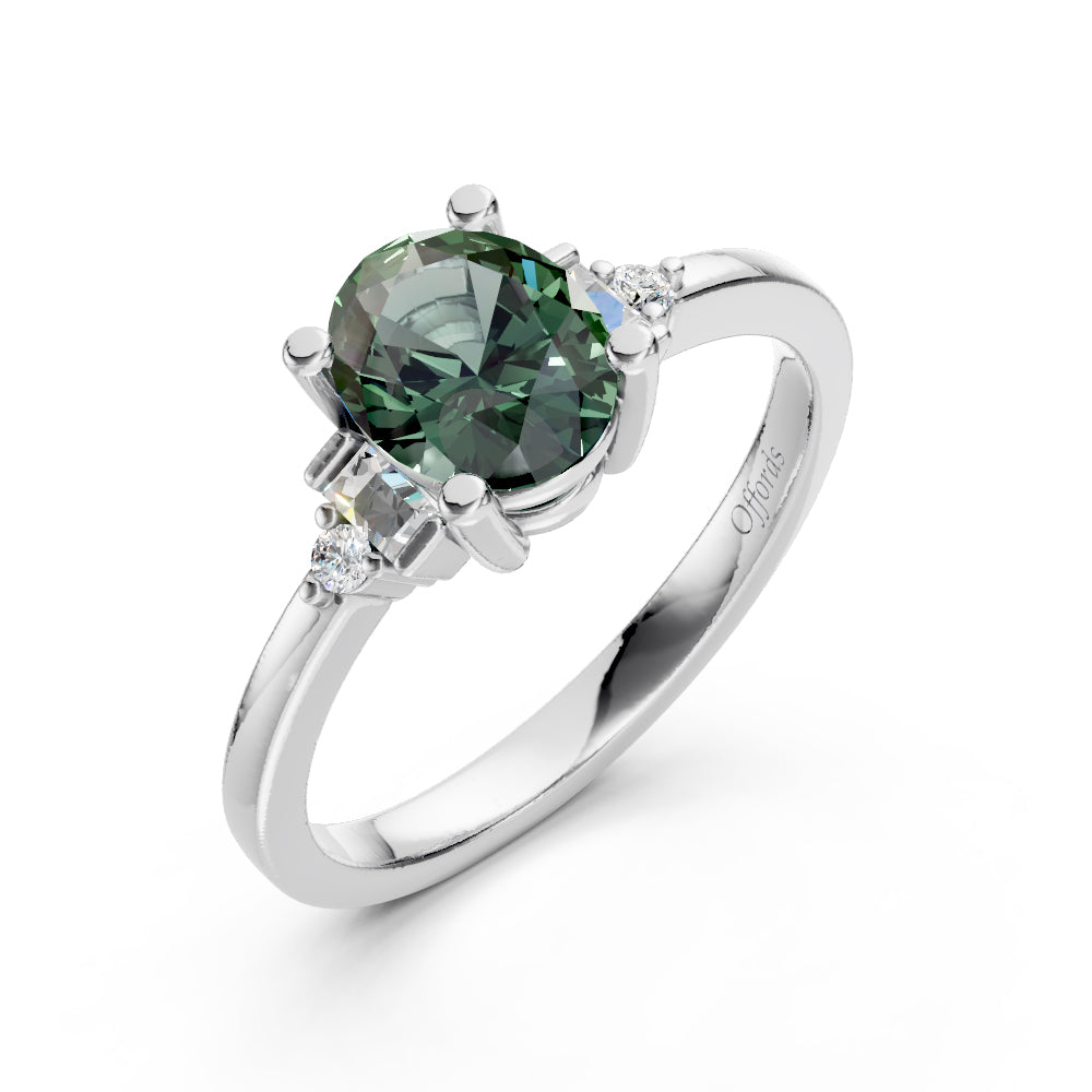Platinum teal sapphire & diamond 5 stone ring