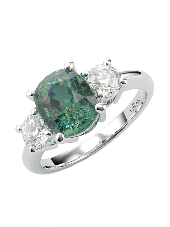 Platinum teal sapphire & diamond three stone ring