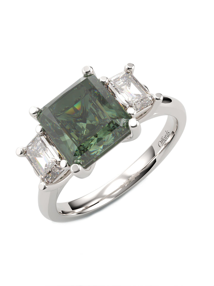Platinum teal sapphire & diamond three stone ring