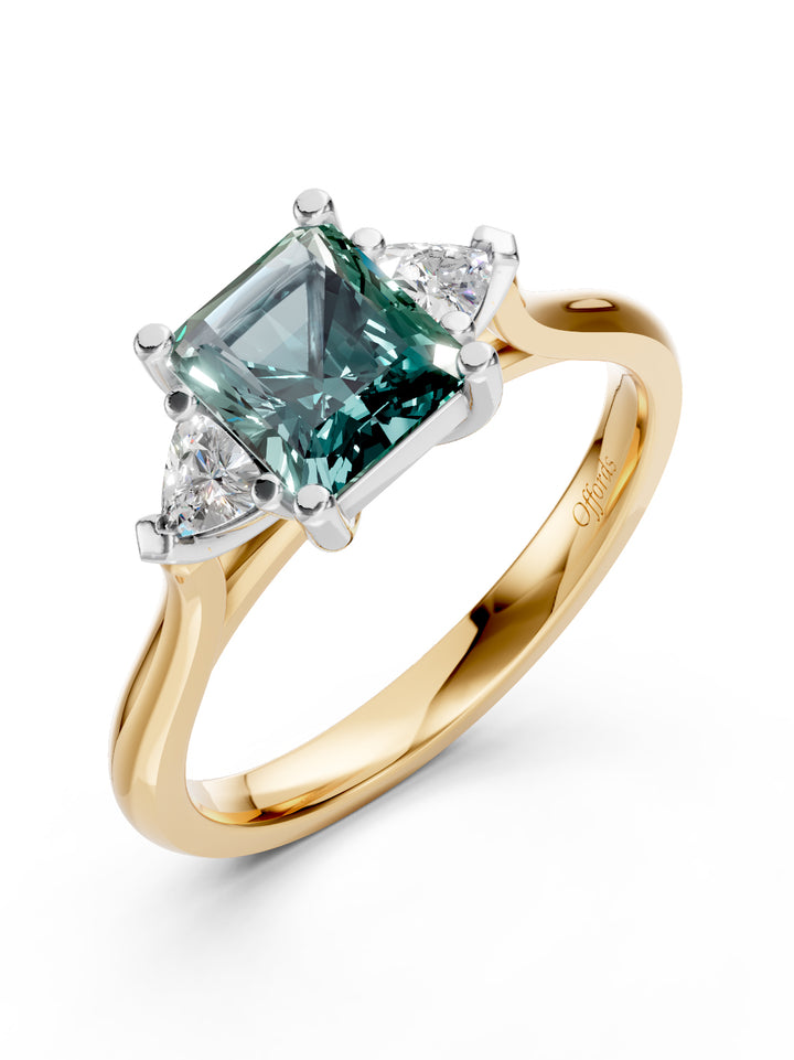 Platinum teal sapphire &amp; diamond three stone ring