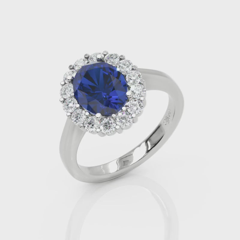 Platinum sapphire & diamond oval cluster ring