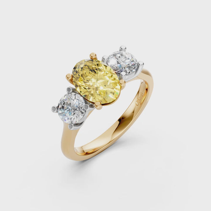 18ct & platinum laboratory grown fancy vivid yellow and white diamond three stone ring