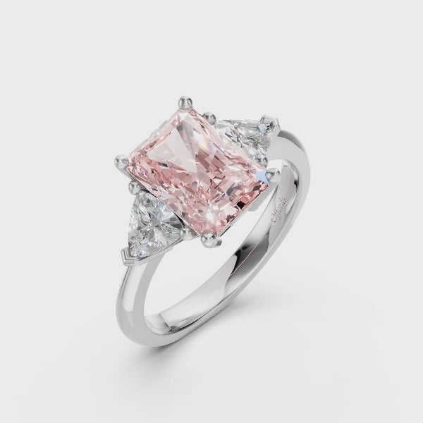 Platinum laboratory grown fancy vivid pink and trilliant cut diamond ring