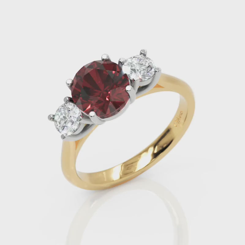 18ct yellow gold & platinum burgundy sapphire & diamond three stone ring