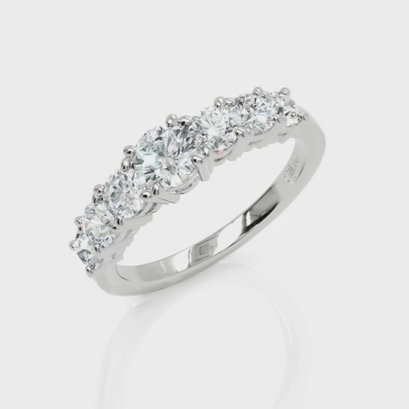 Platinum graduated diamond seven stone ring