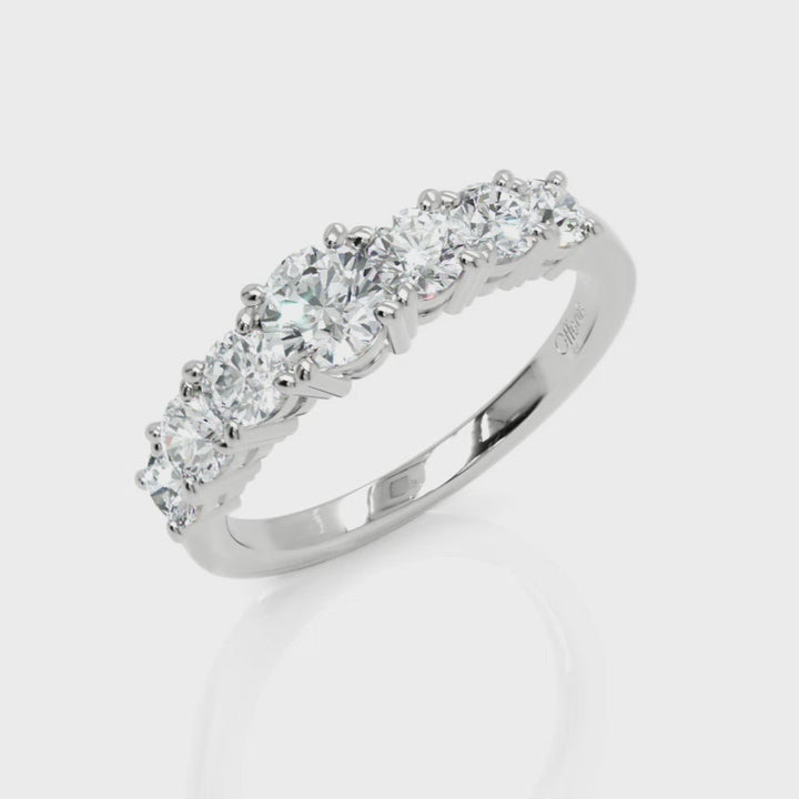 Platinum graduated diamond seven stone ring