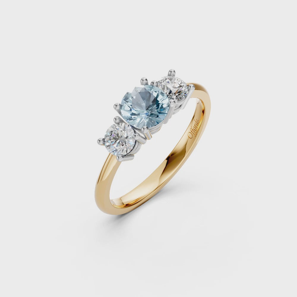 18ct yellow gold and platinum aquamarine and diamond three stone ring
