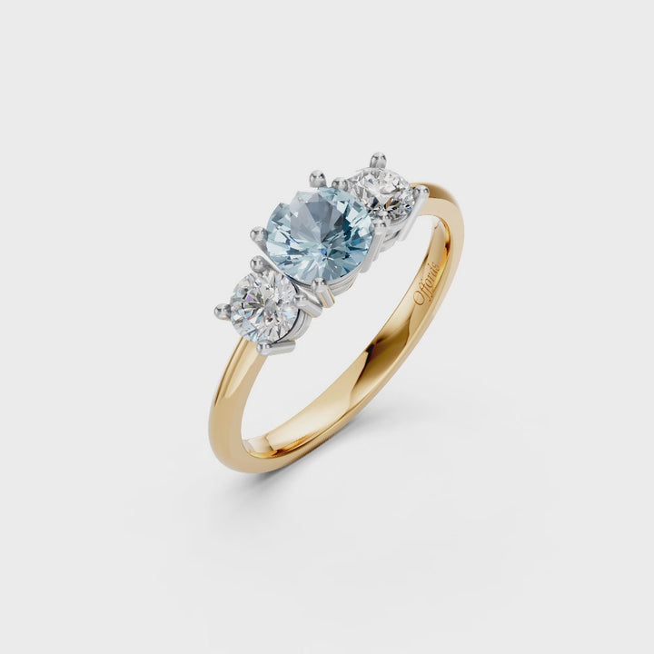 18ct yellow gold and platinum aquamarine and diamond three stone ring