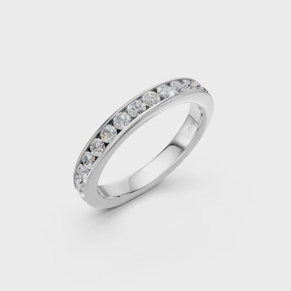 Platinum brilliant cut diamond channel set eternity ring