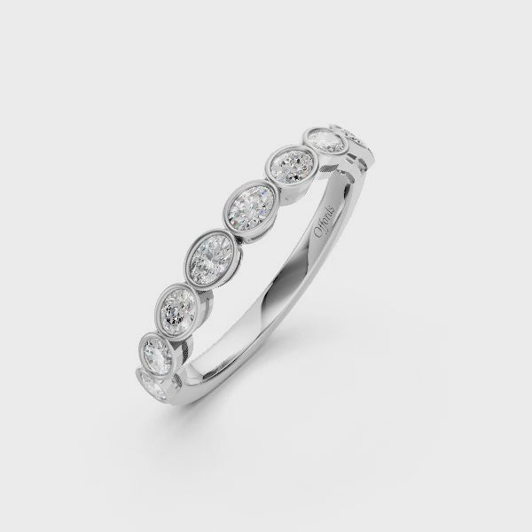 Platinum oval cut diamond bezel set eternity ring - 0.48ct