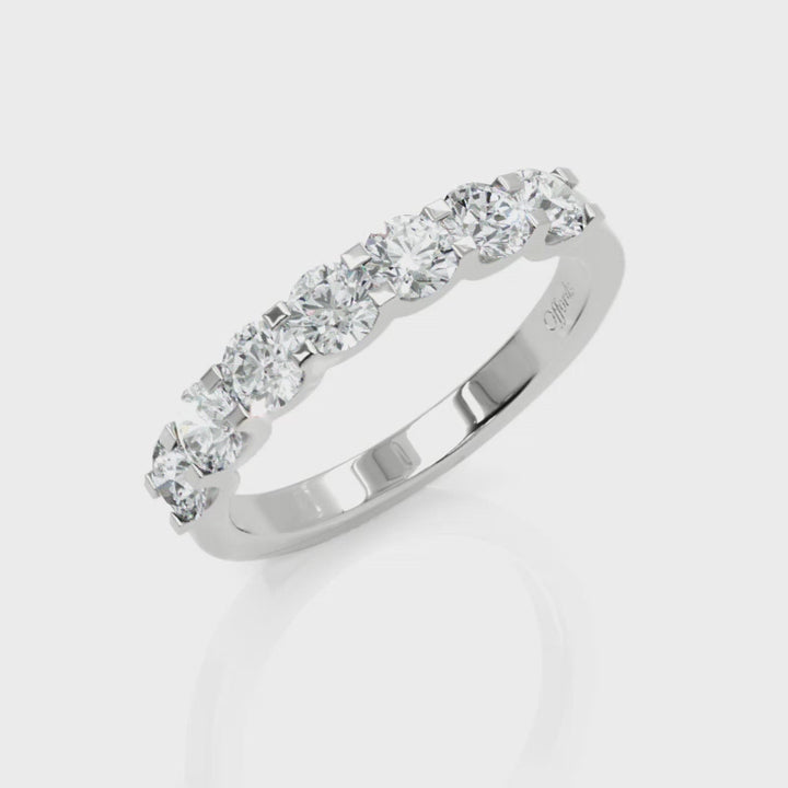 Platinum seven stone diamond eternity ring