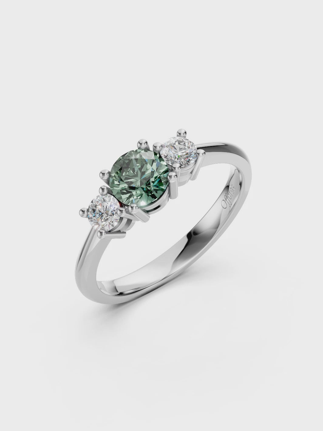 Platinum teal sapphire & diamond three stone ring